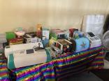 Photo of vendor table displaying miscellaneous items for sale.